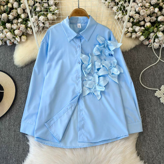 Elegant Sky Blue Floral Ribbon Shirt – Trendy & Chic Women’s Blouse